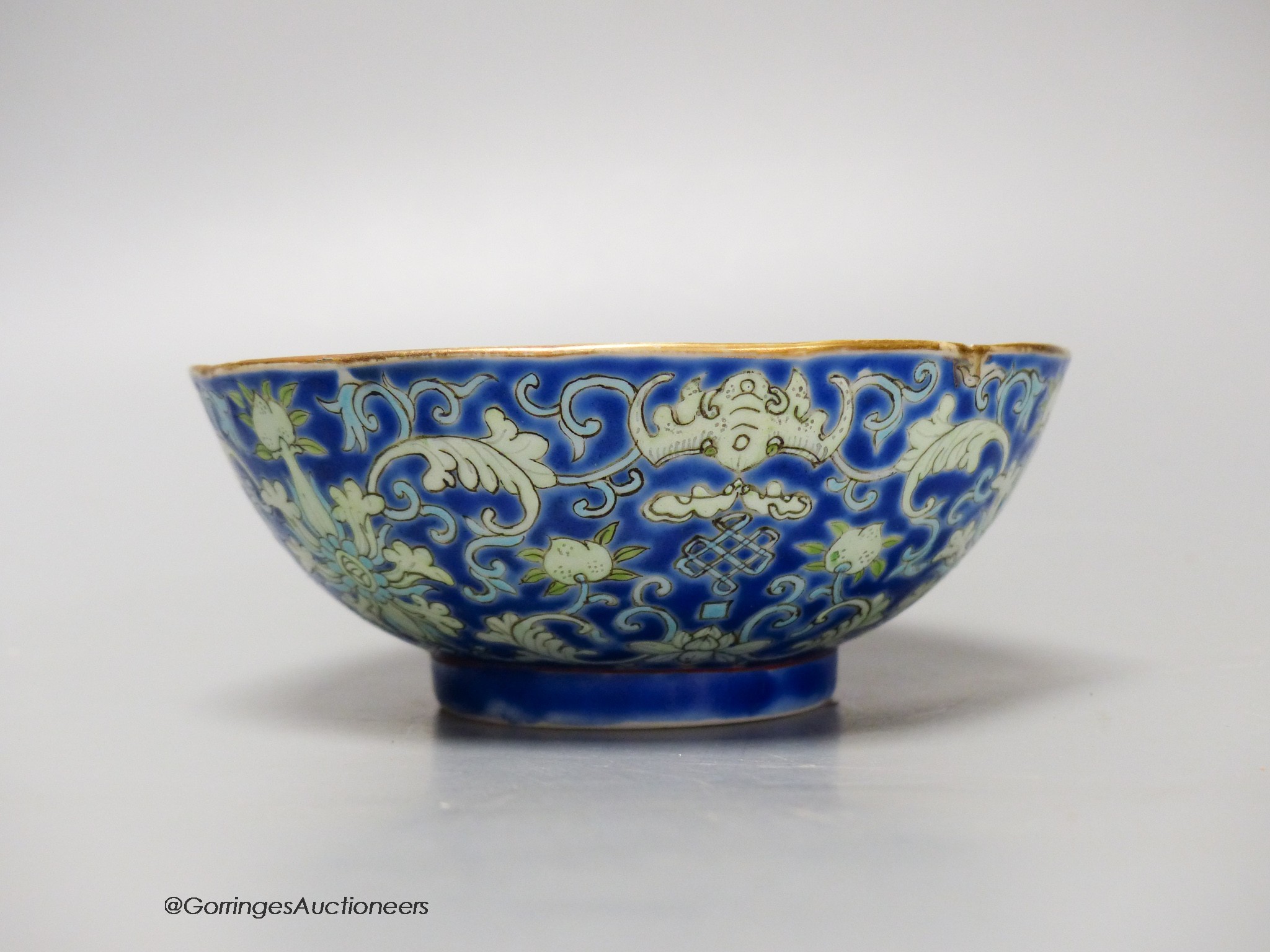 A Chinese blue ground bowl, Tongzhi mark and period (1862-74), 13cm diameter